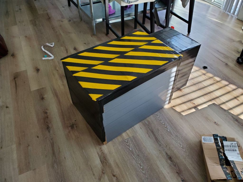 Cardboard box ghost trap, missing detail pieces. 