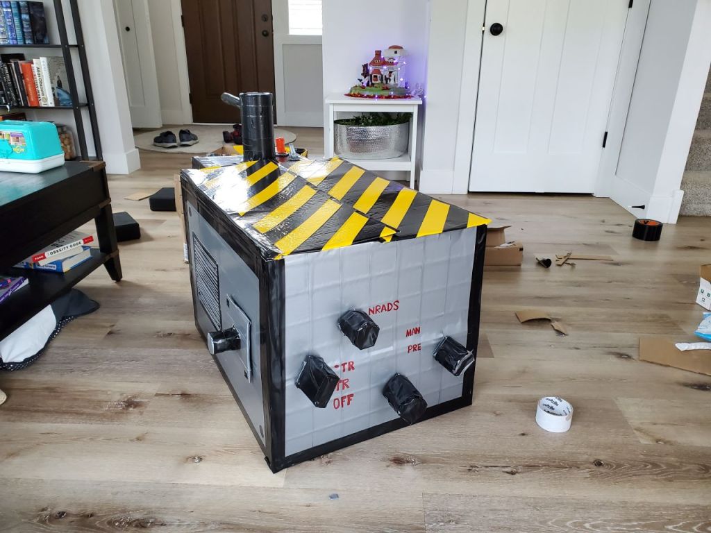 Completed cardboard and duct tape Ghostbusters ghost trap. 