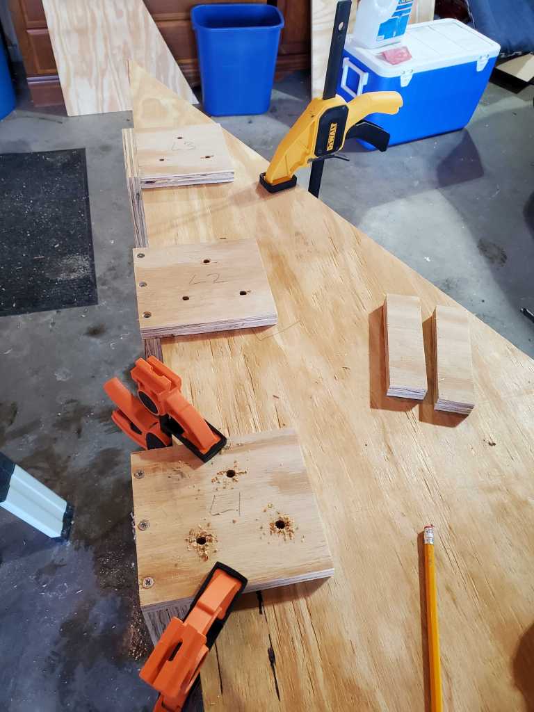 The brackets on the triangle piece drilled through.