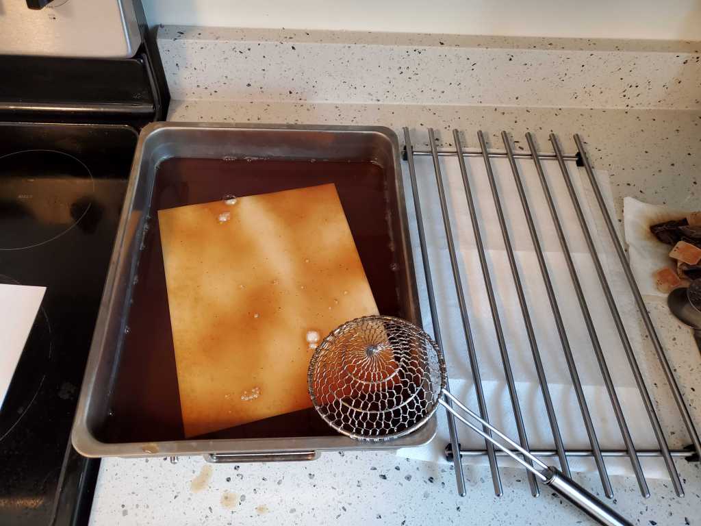 Paper soaking in tea.