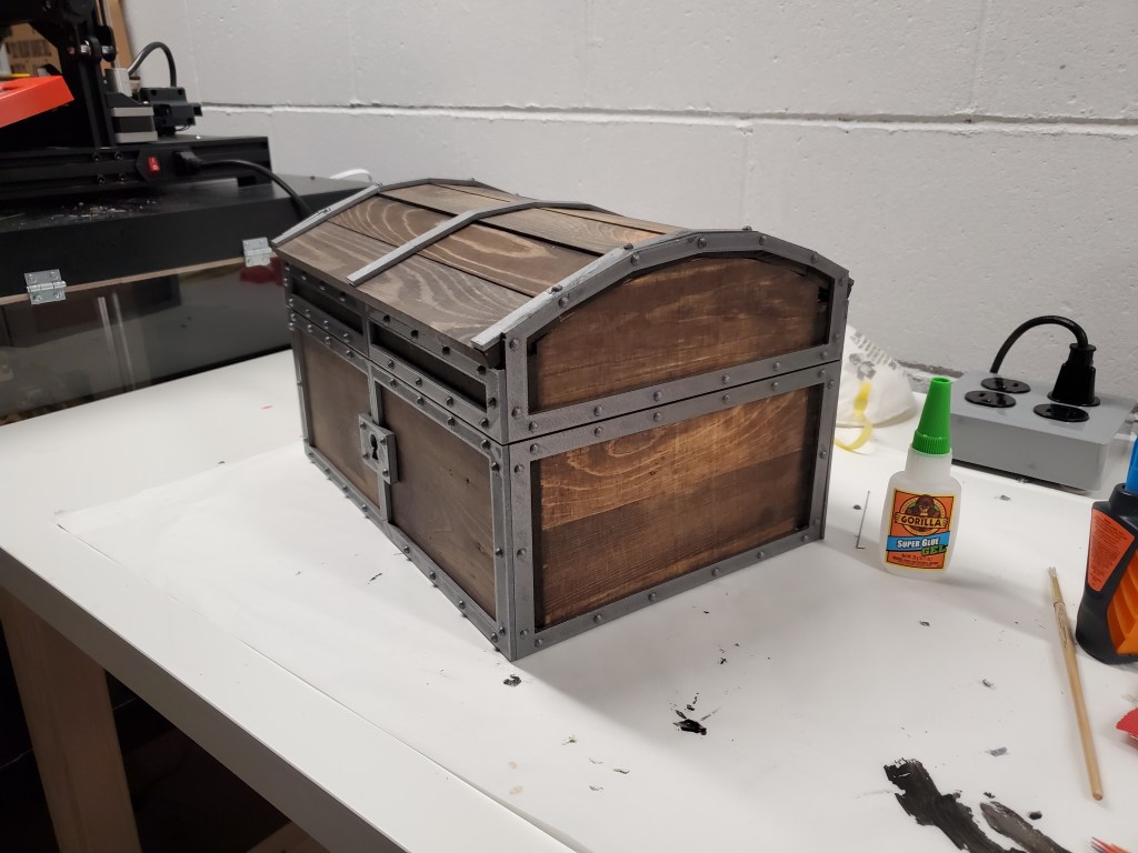 The banding superglued to the chest. 