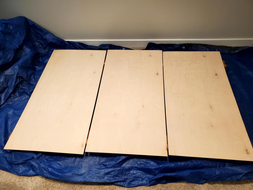 3 pieces of 2' x 4' plywood, sanded. 