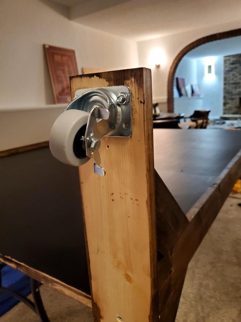 Caster attached to the feet.