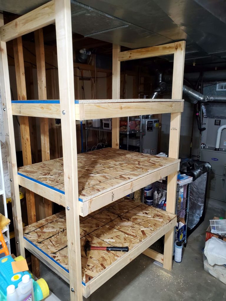 Simple OSB shelving added to the shelving structure.